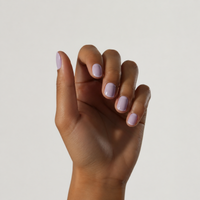 Lilac Luck Active nail polish – a delicate, semi-transparent shade of lilac pink –