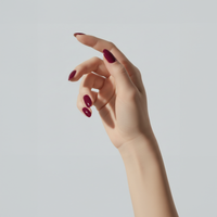 Classic Plum Noir nail polish – a deep, wine-burgundy shade with a hint of ripe cherry – 
