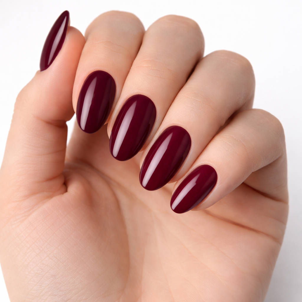 Classic Plum Noir nail polish – a deep wine-burgundy shade with a hint of ripe cherry